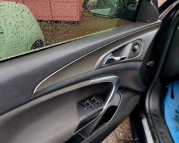 Чорний Опель Інсігнія, об'ємом двигуна 2 л та пробігом 250 тис. км за 7999 $, фото 6 на Automoto.ua