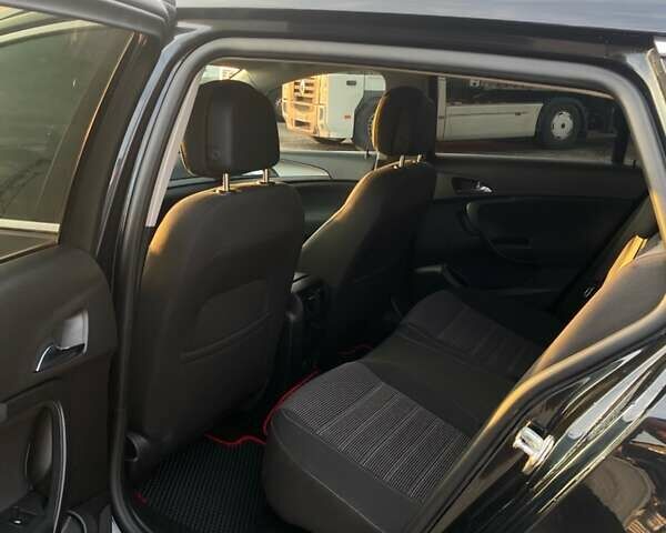 Черный Опель Инсигния, объемом двигателя 1.96 л и пробегом 335 тыс. км за 8200 $, фото 7 на Automoto.ua