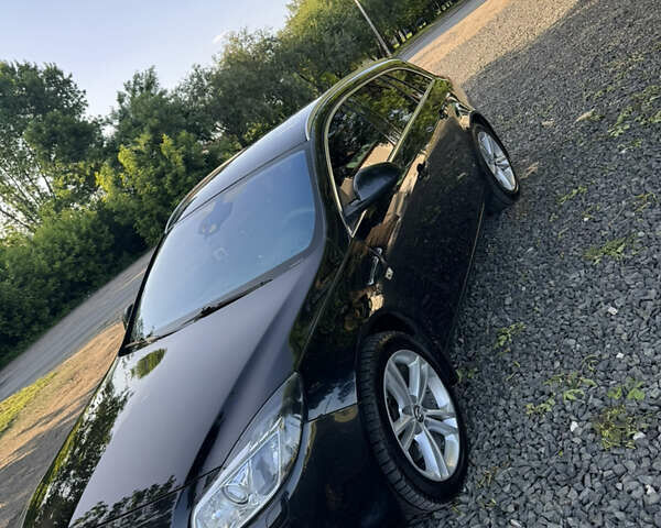 Черный Опель Инсигния, объемом двигателя 1.96 л и пробегом 301 тыс. км за 7600 $, фото 1 на Automoto.ua