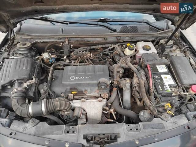 Черный Опель Инсигния, объемом двигателя 1.4 л и пробегом 344 тыс. км за 6800 $, фото 1 на Automoto.ua