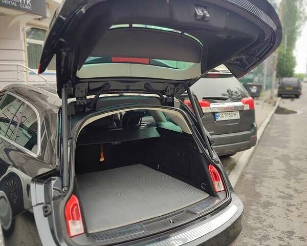 Черный Опель Инсигния, объемом двигателя 1.96 л и пробегом 301 тыс. км за 7900 $, фото 16 на Automoto.ua