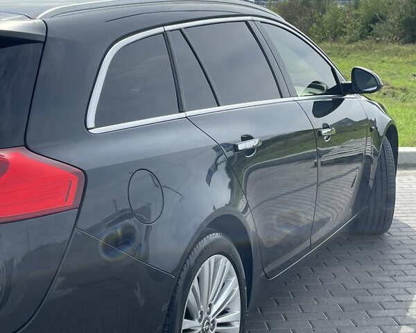 Чорний Опель Інсігнія, об'ємом двигуна 1.96 л та пробігом 256 тис. км за 8175 $, фото 12 на Automoto.ua