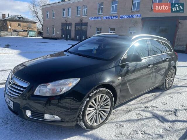 Чорний Опель Інсігнія, об'ємом двигуна 2 л та пробігом 277 тис. км за 9300 $, фото 5 на Automoto.ua