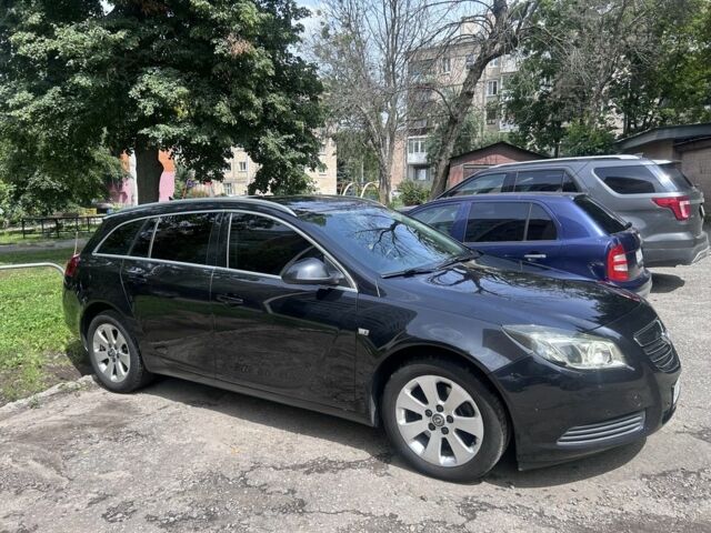 Чорний Опель Інсігнія, об'ємом двигуна 2 л та пробігом 243 тис. км за 7513 $, фото 1 на Automoto.ua