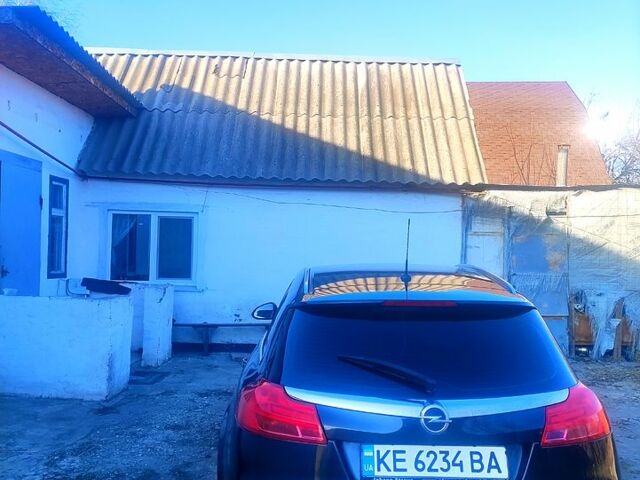 Чорний Опель Інсігнія, об'ємом двигуна 2 л та пробігом 297 тис. км за 7499 $, фото 3 на Automoto.ua