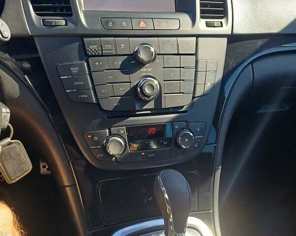 Черный Опель Инсигния, объемом двигателя 2 л и пробегом 250 тыс. км за 10500 $, фото 2 на Automoto.ua