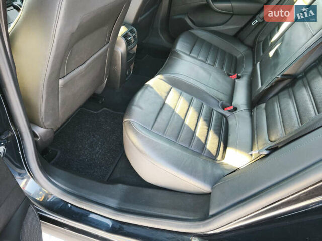 Чорний Опель Інсігнія, об'ємом двигуна 1.96 л та пробігом 210 тис. км за 8999 $, фото 11 на Automoto.ua