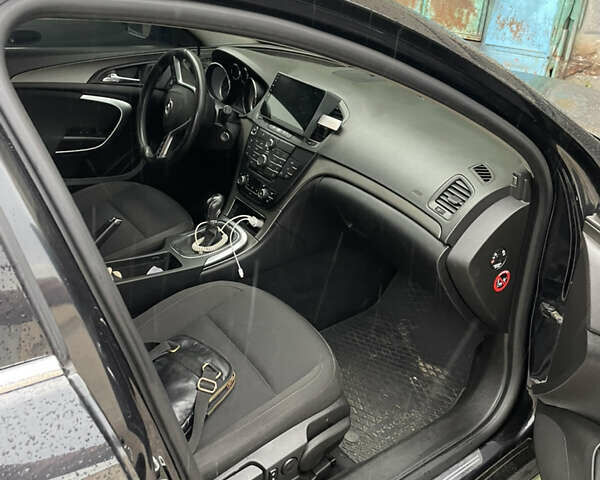 Черный Опель Инсигния, объемом двигателя 1.96 л и пробегом 302 тыс. км за 7700 $, фото 1 на Automoto.ua