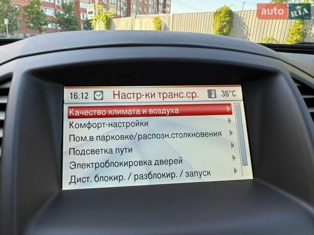 Чорний Опель Інсігнія, об'ємом двигуна 1.6 л та пробігом 191 тис. км за 9000 $, фото 29 на Automoto.ua