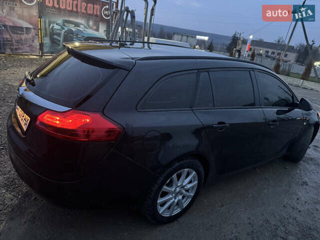 Чорний Опель Інсігнія, об'ємом двигуна 1.96 л та пробігом 205 тис. км за 8000 $, фото 6 на Automoto.ua