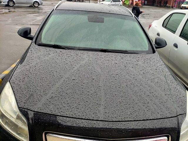 Чорний Опель Інсігнія, об'ємом двигуна 2 л та пробігом 250 тис. км за 7999 $, фото 2 на Automoto.ua