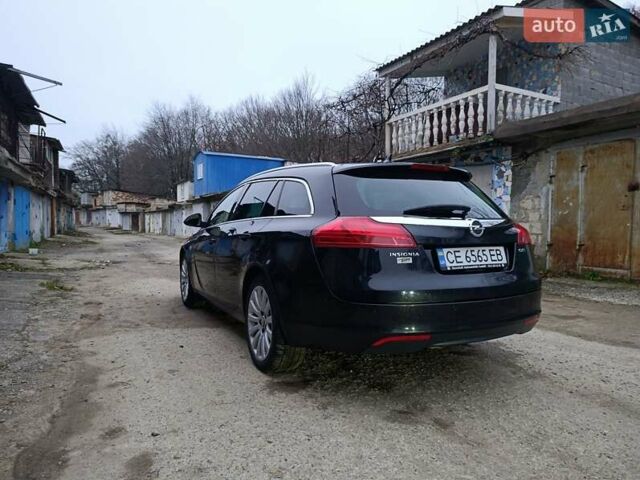 Чорний Опель Інсігнія, об'ємом двигуна 1.96 л та пробігом 240 тис. км за 8888 $, фото 10 на Automoto.ua