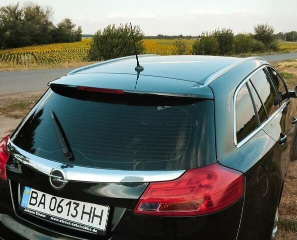 Черный Опель Инсигния, объемом двигателя 1.96 л и пробегом 293 тыс. км за 8100 $, фото 4 на Automoto.ua