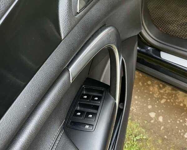 Черный Опель Инсигния, объемом двигателя 1.96 л и пробегом 235 тыс. км за 7900 $, фото 16 на Automoto.ua