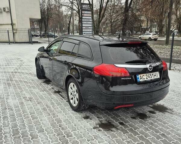 Черный Опель Инсигния, объемом двигателя 1.96 л и пробегом 259 тыс. км за 8350 $, фото 7 на Automoto.ua