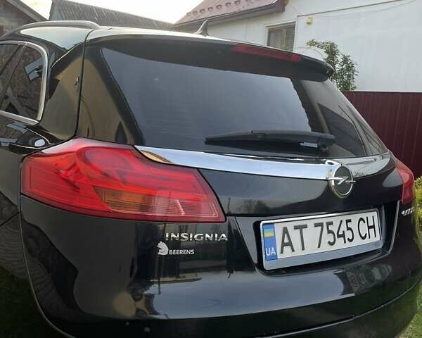 Черный Опель Инсигния, объемом двигателя 1.96 л и пробегом 235 тыс. км за 7900 $, фото 5 на Automoto.ua