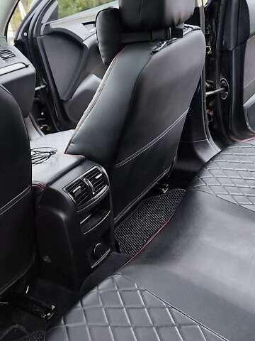 Черный Опель Инсигния, объемом двигателя 1.96 л и пробегом 245 тыс. км за 8599 $, фото 16 на Automoto.ua