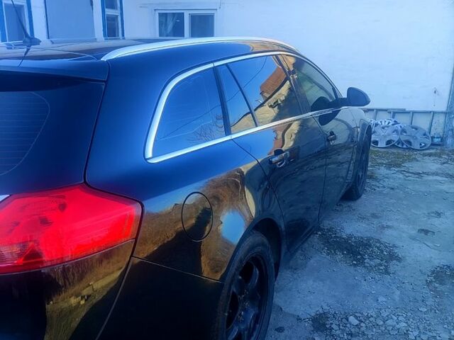 Чорний Опель Інсігнія, об'ємом двигуна 2 л та пробігом 297 тис. км за 7499 $, фото 5 на Automoto.ua