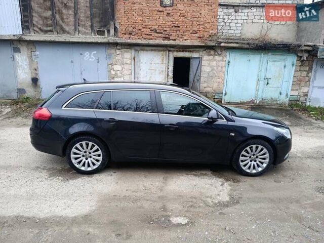 Чорний Опель Інсігнія, об'ємом двигуна 1.96 л та пробігом 240 тис. км за 8888 $, фото 8 на Automoto.ua