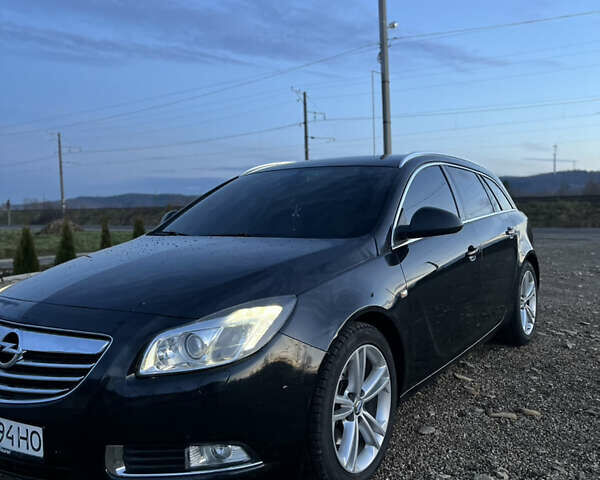 Чорний Опель Інсігнія, об'ємом двигуна 1.96 л та пробігом 255 тис. км за 7000 $, фото 1 на Automoto.ua
