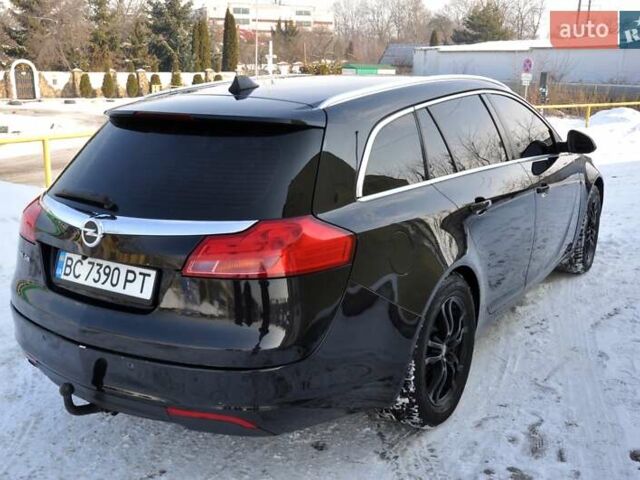 Чорний Опель Інсігнія, об'ємом двигуна 1.96 л та пробігом 298 тис. км за 5800 $, фото 7 на Automoto.ua