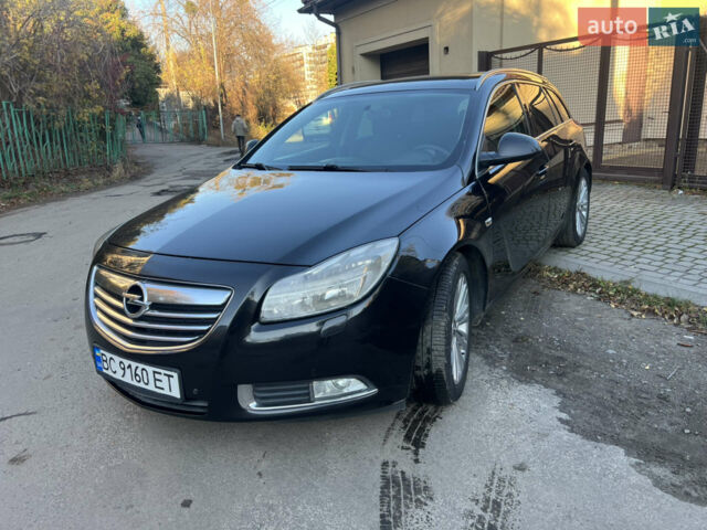 Чорний Опель Інсігнія, об'ємом двигуна 2 л та пробігом 261 тис. км за 8500 $, фото 4 на Automoto.ua