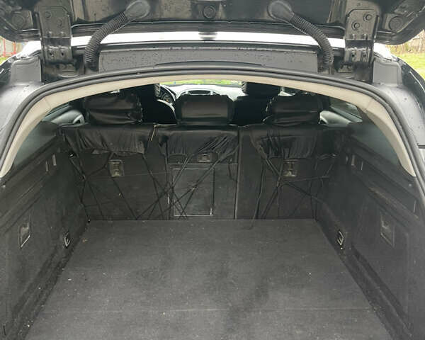 Чорний Опель Інсігнія, об'ємом двигуна 2 л та пробігом 220 тис. км за 7500 $, фото 8 на Automoto.ua