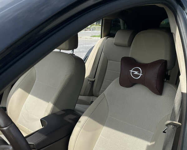 Чорний Опель Інсігнія, об'ємом двигуна 1.96 л та пробігом 256 тис. км за 8175 $, фото 23 на Automoto.ua