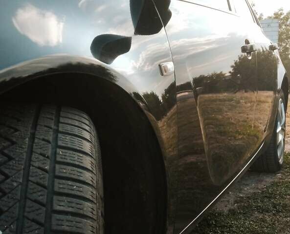 Черный Опель Инсигния, объемом двигателя 1.96 л и пробегом 293 тыс. км за 8100 $, фото 18 на Automoto.ua