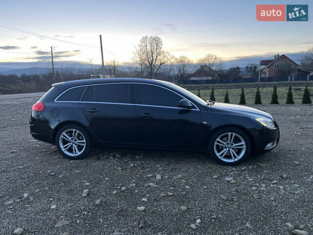 Чорний Опель Інсігнія, об'ємом двигуна 1.96 л та пробігом 255 тис. км за 7000 $, фото 7 на Automoto.ua