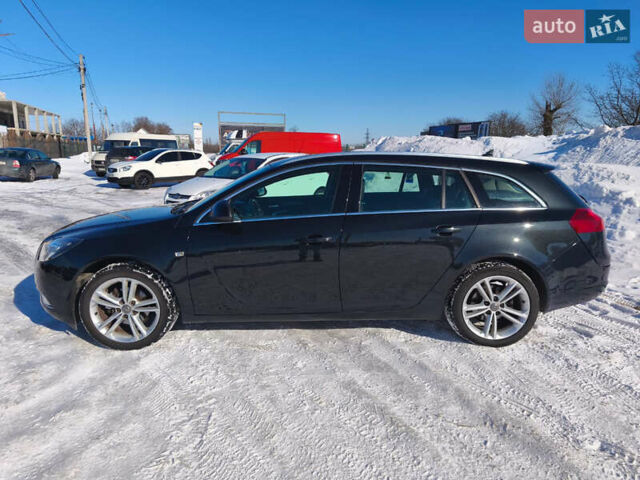 Чорний Опель Інсігнія, об'ємом двигуна 1.96 л та пробігом 210 тис. км за 8999 $, фото 2 на Automoto.ua