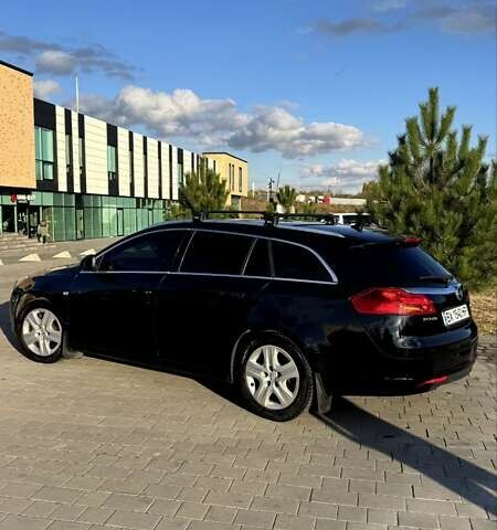 Опель Инсигния 2012 в Хмельницком на Automoto.ua Черный Опель Инсигния, объемом двигателя 2 л и пробегом 216 тыс. км за 7300 $, фото 5 на Automoto.ua