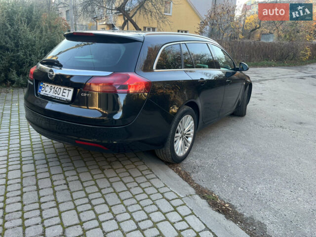 Чорний Опель Інсігнія, об'ємом двигуна 2 л та пробігом 261 тис. км за 8500 $, фото 6 на Automoto.ua