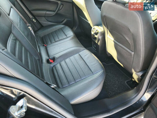 Чорний Опель Інсігнія, об'ємом двигуна 1.96 л та пробігом 210 тис. км за 8999 $, фото 13 на Automoto.ua