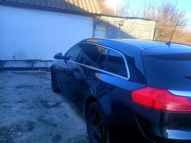 Черный Опель Инсигния, объемом двигателя 2 л и пробегом 296 тыс. км за 7300 $, фото 4 на Automoto.ua