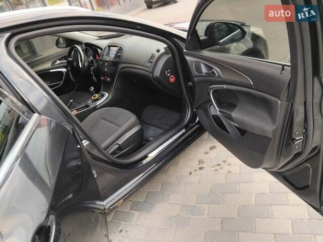 Черный Опель Инсигния, объемом двигателя 1.4 л и пробегом 344 тыс. км за 6800 $, фото 4 на Automoto.ua