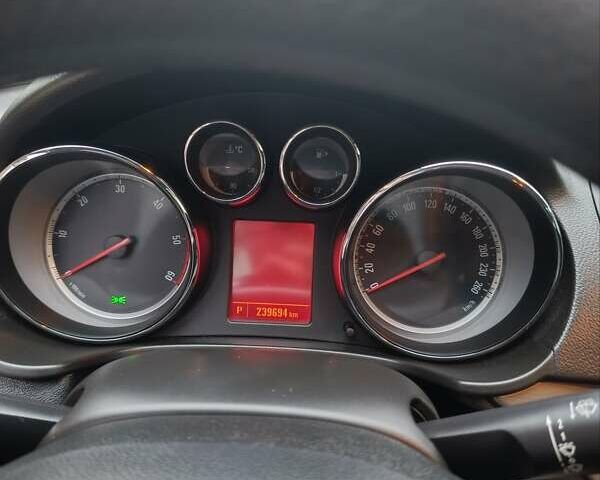 Чорний Опель Інсігнія, об'ємом двигуна 1.96 л та пробігом 240 тис. км за 8888 $, фото 19 на Automoto.ua