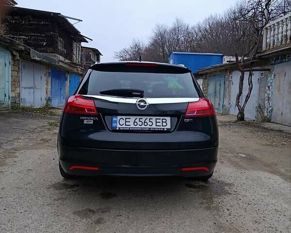 Чорний Опель Інсігнія, об'ємом двигуна 1.96 л та пробігом 240 тис. км за 8888 $, фото 14 на Automoto.ua