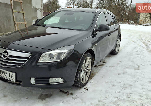 Чорний Опель Інсігнія, об'ємом двигуна 1.96 л та пробігом 176 тис. км за 10950 $, фото 4 на Automoto.ua