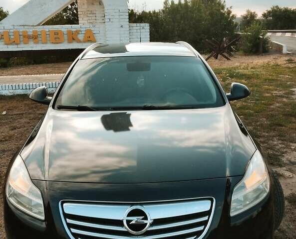 Черный Опель Инсигния, объемом двигателя 1.96 л и пробегом 293 тыс. км за 8100 $, фото 2 на Automoto.ua