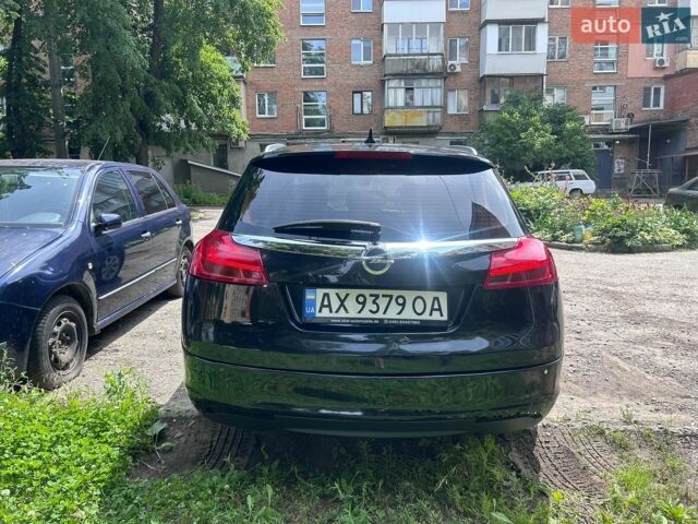 Черный Опель Инсигния, объемом двигателя 1.96 л и пробегом 239 тыс. км за 7500 $, фото 2 на Automoto.ua
