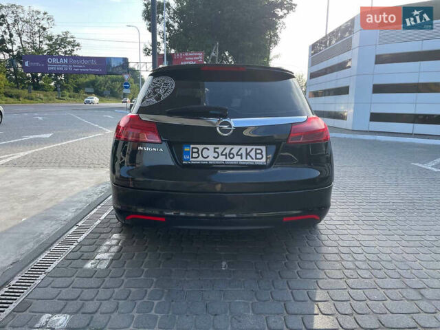 Черный Опель Инсигния, объемом двигателя 1.96 л и пробегом 305 тыс. км за 6200 $, фото 5 на Automoto.ua