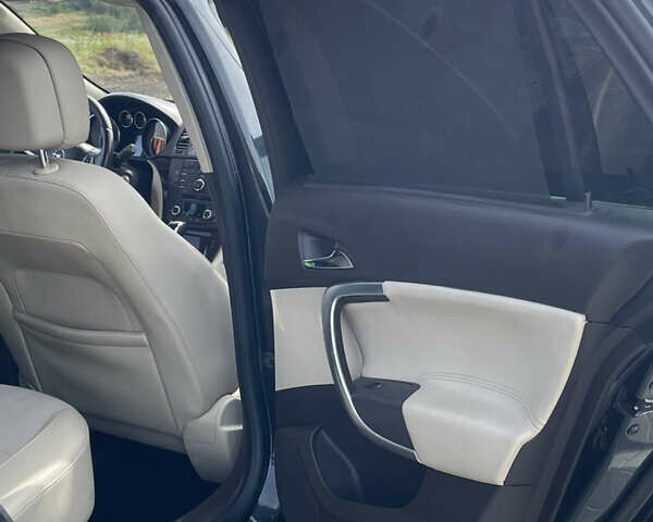 Чорний Опель Інсігнія, об'ємом двигуна 1.96 л та пробігом 256 тис. км за 8175 $, фото 20 на Automoto.ua