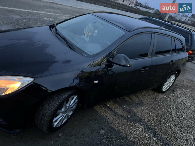 Чорний Опель Інсігнія, об'ємом двигуна 1.96 л та пробігом 205 тис. км за 8000 $, фото 5 на Automoto.ua