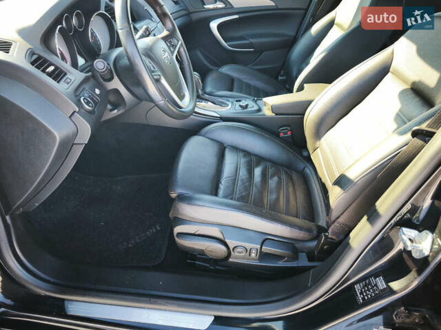 Чорний Опель Інсігнія, об'ємом двигуна 1.96 л та пробігом 210 тис. км за 8999 $, фото 10 на Automoto.ua