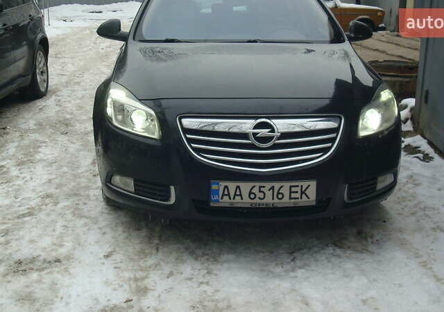 Чорний Опель Інсігнія, об'ємом двигуна 1.96 л та пробігом 247 тис. км за 9499 $, фото 7 на Automoto.ua