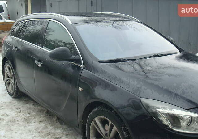 Чорний Опель Інсігнія, об'ємом двигуна 1.96 л та пробігом 247 тис. км за 9499 $, фото 2 на Automoto.ua