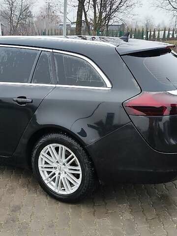 Черный Опель Инсигния, объемом двигателя 1.96 л и пробегом 245 тыс. км за 8599 $, фото 1 на Automoto.ua