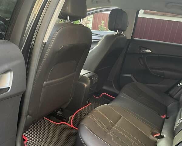 Черный Опель Инсигния, объемом двигателя 1.96 л и пробегом 235 тыс. км за 7900 $, фото 10 на Automoto.ua