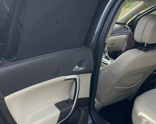 Чорний Опель Інсігнія, об'ємом двигуна 1.96 л та пробігом 256 тис. км за 8175 $, фото 26 на Automoto.ua